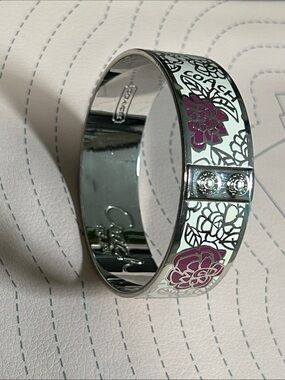 Coach Silver-Tone Floral Enamel Bangle with Pink Accents